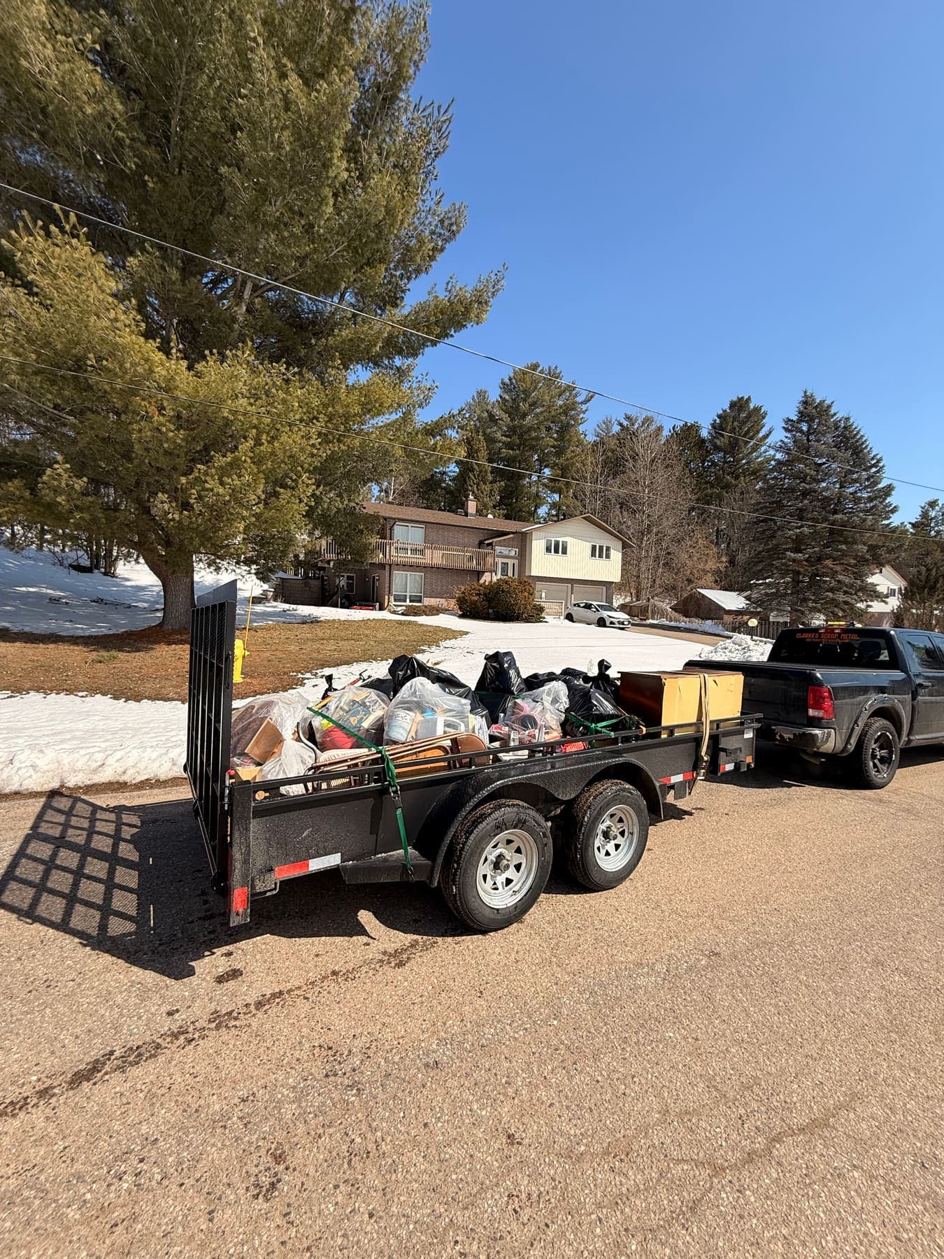 PVS trailer loaded with junk and debris ready for disposal