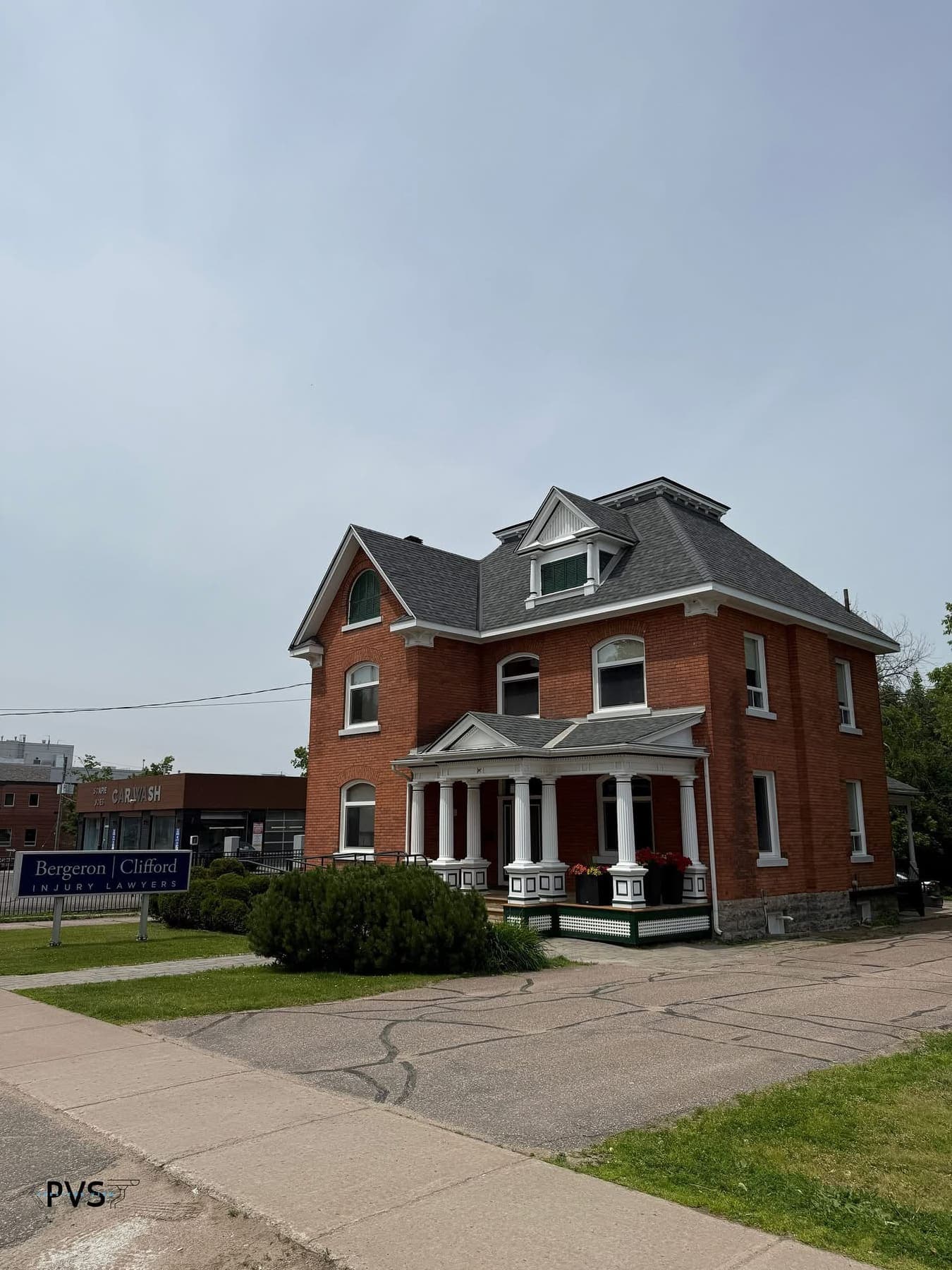 Cleaned exterior of a red brick Victorian home in Pembroke